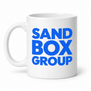 White Mug with Sandbox Group Logo on a White Background